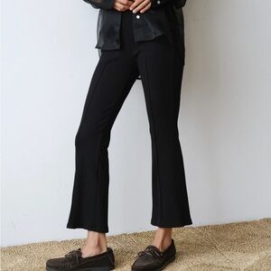 DONNI. Rib kick flare black XS
